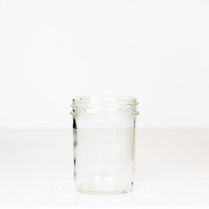 Wide Mouth Unmarked Vintage Dominion Near pint (13 oz) mason jar on a white background.