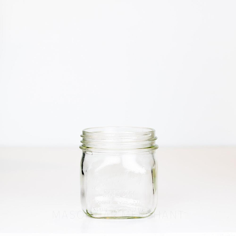 Vintage Dominion Mason Short Square Wide Mouth Pint jar on a white background.