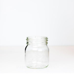 Adorable gem mouth 13 oz mason jar with Dominion logo on a white background 